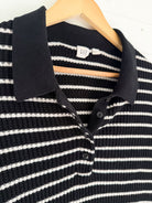 Polo en tricot à manches courtes ligné noir et blanc GAP – seconde main