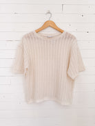 Chandail en maille blanc cassé à manches courtes Zara – seconde main